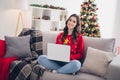 Photo of relaxed cute positive lady home working remote computer choose new present for her family xmas atmosphere Royalty Free Stock Photo