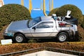 Use "Ready Player One" movie. Photo of replica car of "De Lorean"