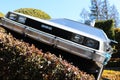 Use "Ready Player One" movie. Photo of replica car of "De Lorean"