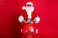 Photo of retired grandpa white beard ride fast retro scooter waiting green light hurry christmas event opening snowy