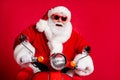 Photo of retired grandpa white beard ride retro moped confident carefree feel wind face driving hurry christmas event