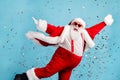 Photo of retired old man grey beard carefree raise hands flying pose dance party ready jump pool confetti wear santa x