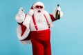 Photo of retired old man grey beard funky hold bottle full glass sparkling wine can`t stop drink crazy open mouth wear