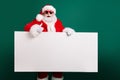 Photo of retired stylish grandfather grey hair beard hold white board thumb-up assure chosen object wear red santa x-mas