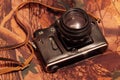 Photo of retro camera on the camouflage