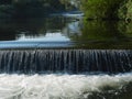 Photo of a river flowing through a beautiful park. Spring, Summer. Royalty Free Stock Photo