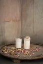 Romantic candles with floral petals. Aromatherapy.