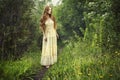 Photo of romantic woman in fairy forest