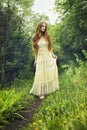 Photo of romantic woman in fairy forest