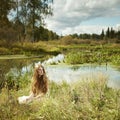 Photo of romantic woman in fairy forest