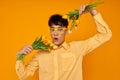 Photo of romantic young boyfriend in yellow glasses with a bouquet of flowers Lifestyle unaltered Royalty Free Stock Photo