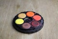 round watercolor paints palette black Royalty Free Stock Photo