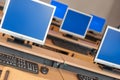 Photo of row computers in classroom or other educational institution Royalty Free Stock Photo