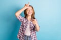 Photo of rude bully small girl wear checkered shirt pointing finger you showing loser sign isolated blue color Royalty Free Stock Photo