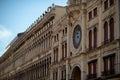 Photo with saint marks clocktower at piazza san marco