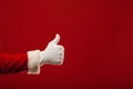 Photo of Santa Claus gloved hand in pointing Royalty Free Stock Photo