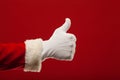 Photo of Santa Claus gloved hand in pointing Royalty Free Stock Photo