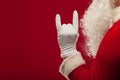 Photo of Santa Claus gloved hand in pointing gesture. fingers Royalty Free Stock Photo