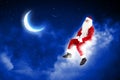 Photo of santa claus sitting on the moon