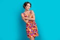 Photo of satisfied pretty good mood woman with bob hair dressed colorful clothes embrace herself isolated on blue color Royalty Free Stock Photo