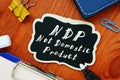 The photo says Net Domestic Product NDP. Notepad, pen, marker Royalty Free Stock Photo