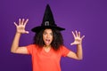 Photo of scary terrible spooky frightful warlock wearing conical cap casting spell to curse you with horrifying facial