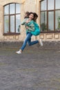 photo of school girl jump childhood with backpack, education. school girl childhood jump