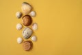 Photo of sea shells. Yellow background. Summer concept.