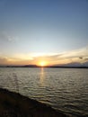 Photo of seconds of sunrise from a reservoir Royalty Free Stock Photo