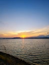 Photo of seconds of sunrise from a reservoir Royalty Free Stock Photo