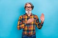 Photo of senior man promise swear to tell the truth justice pride sincere isolated over blue color background Royalty Free Stock Photo