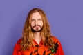 Photo of serious brutal cool person with beard long hairstyle dressed print shirt staring at you isolated on violet