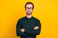 Photo of serious confident young guy dressed smart casual clothes spectacles arms crossed isolated yellow color Royalty Free Stock Photo