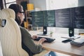 Photo of serious cool lady system admin wear eyeglasses checking framework indoors workplace workstation