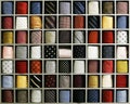 Photo of a shelf containing the collection of ties with various colors, patterns, and designs