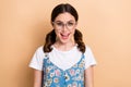 Photo of shiny impressed lady wear flower print dress spectacles open mouth isolated beige color background