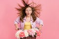 Photo of shocked amazed lady ride bicycle wind blow hair open mouth wear jacket isolated pink color background