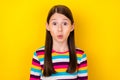 Photo of shocked surprised small lady open mouth sale feedback wear striped shirt isolated yellow color background