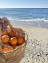 photo shoot with Basket oranges beach Royalty Free Stock Photo