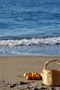 photo shoot with Basket oranges beach Royalty Free Stock Photo