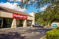 Photo of shops and restaurants at Tower Shops outdoor mall Davie Florida Pep Boys Auto Service and Tires