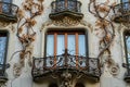 A photo showcasing the intricate design and multiple balconies of a building, An Art Nouveau building with organic forms and Royalty Free Stock Photo