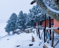 A photo showing abandoned houses covered with snow.