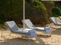 Beach hammocks, hotel relaxation area on seafront Royalty Free Stock Photo