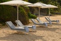 Beach hammocks, hotel relaxation area on shore Royalty Free Stock Photo