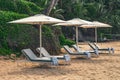 Beach hammocks, hotel relaxation area on bay Royalty Free Stock Photo