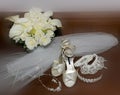 Bride`s Flowers, Shoes, Veil, Garder and Jewelry