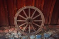 This photo shows a closeup of old wooden wheel in the village. Royalty Free Stock Photo