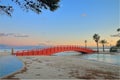 Evening landscape with a bridge on the beach of the island of Palma de Mallorca