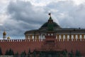 The photo shows the Kremlin and the Kremlin wall, the mausoleum on which the inscription is translated into Russian - Lenin